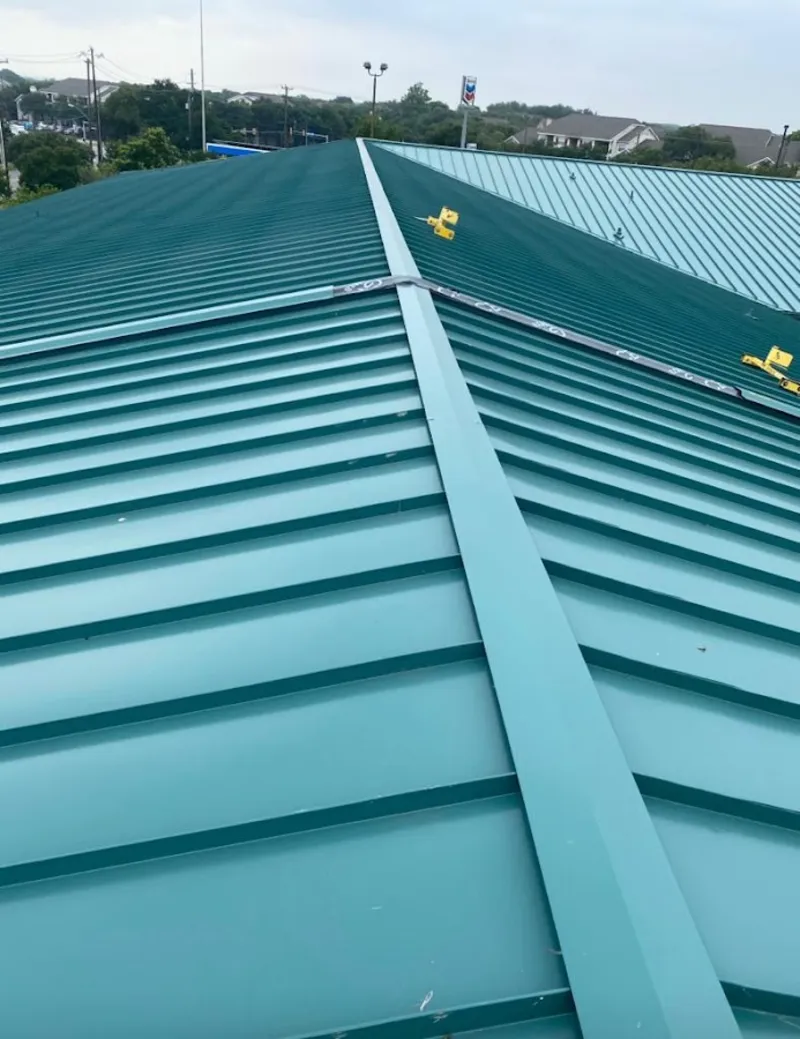 Green commercial metal roof ridge and valley for Metal Roof Repair in Lely Resort